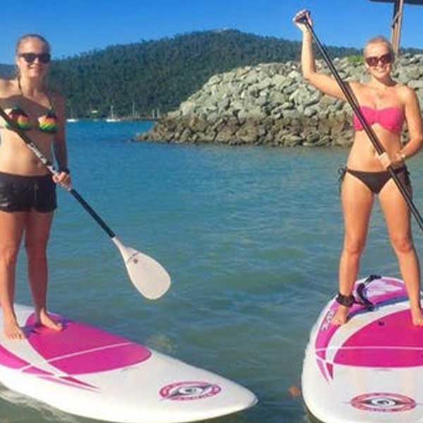 girls on standup paddle board